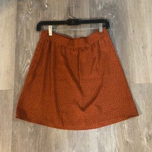 Orange patterned skirt